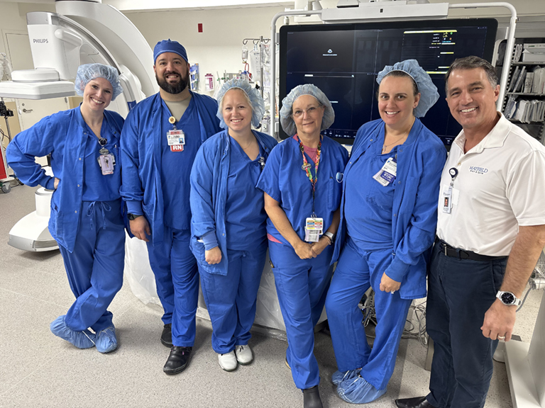 Photo: Dr. Ringer with the medical team in The Christ Hospital angiography suit